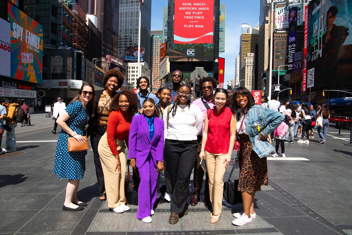 BAA fellows group posing in Times Square
